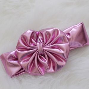 Never been worn: Pink Metallic Headband